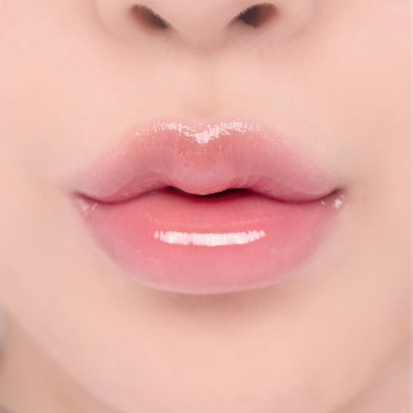 Блиск у молочно-рожевому відтінку Rom&nd Glasting Color Gloss #01 Peony Ballet 0493 фото