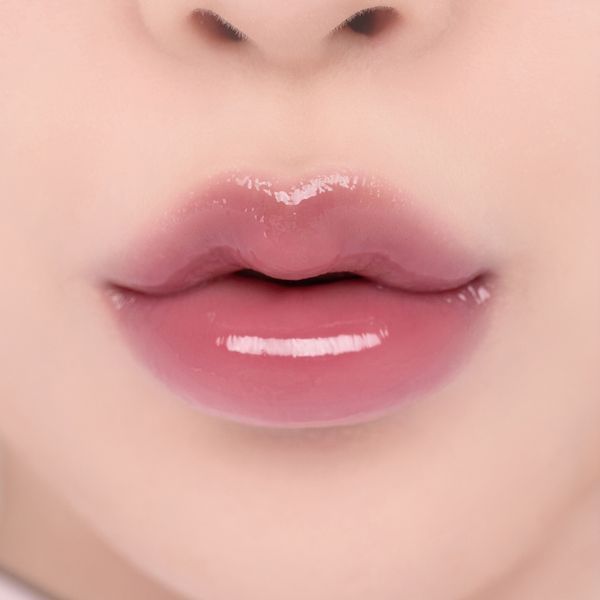 Блиск для губ у виноградному відтінку Rom&nd Glasting Color Gloss #04 Grapy Way 0494 фото